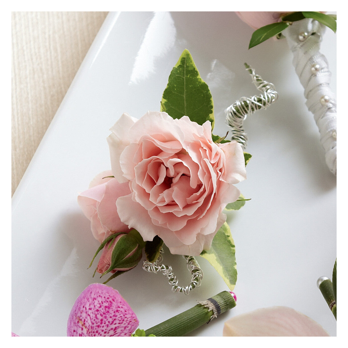 Pink Spray Rose Boutonniere flower arrangement